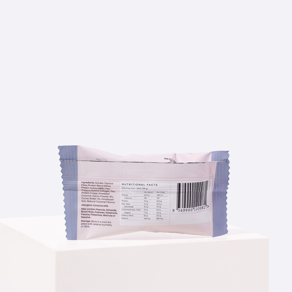 Back of the Enlighten Me Chocolate Protein Ball wrapper, showing the nutritional facts panel, ingredients and allergen information.