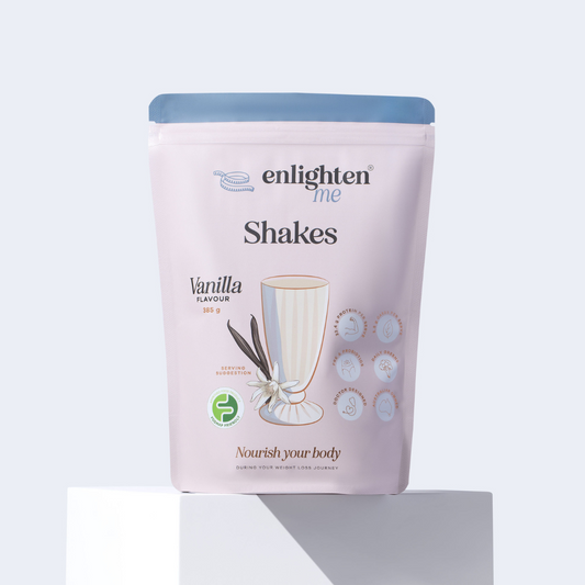 A front view of the Enlighten Me Shakes in Vanilla flavour. Features the FODMAP friendly logo. Meal replacement shakes for weight loss. 