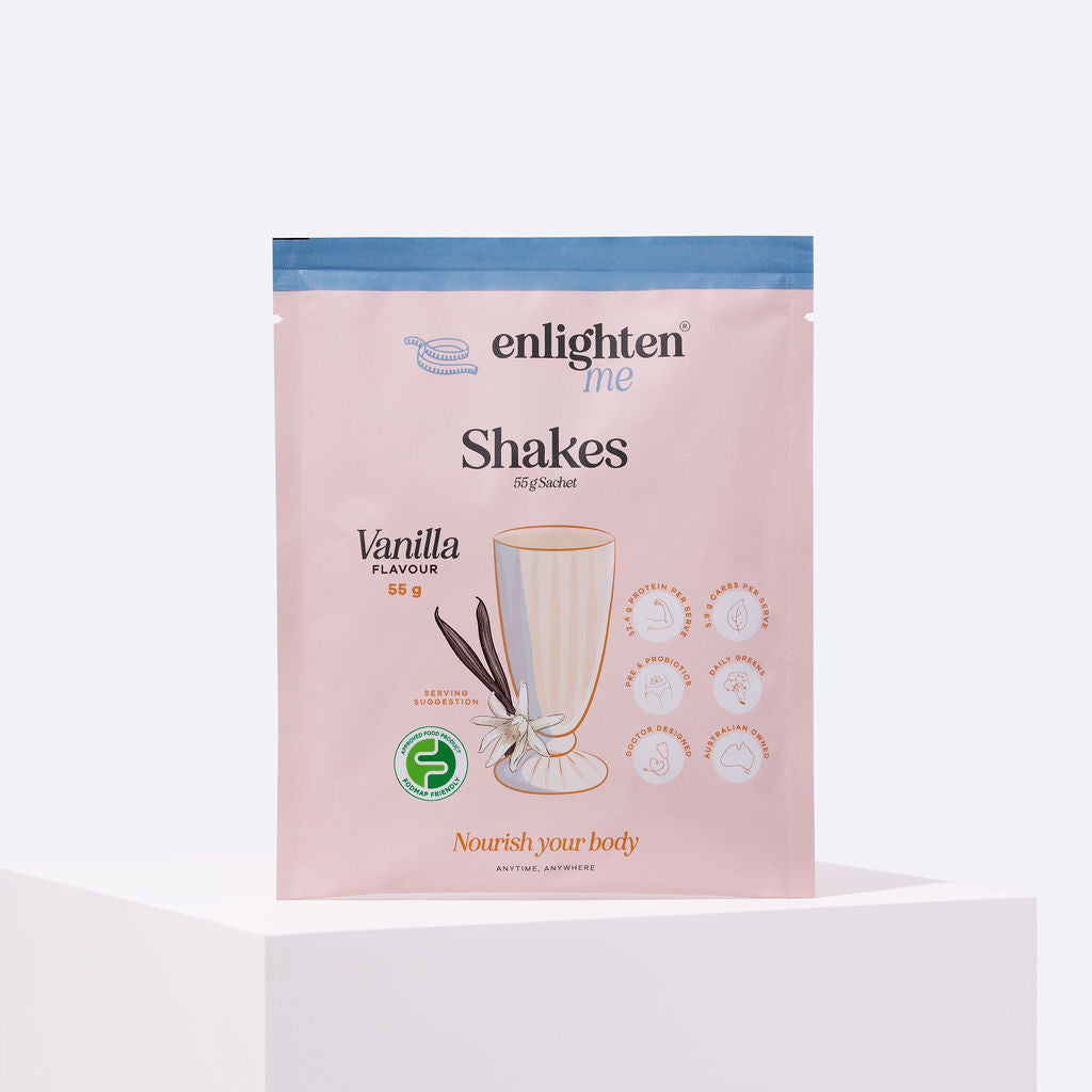 Front of the Enlighten Me Vanilla meal replacement shake 55g sachet, a blush and blue pouch with a vanilla milkshake illustration, FODMAP Friendly badge and high-protein icons.