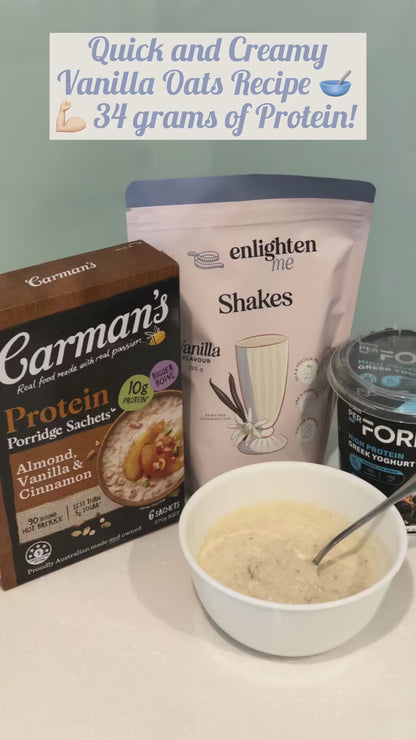 A video showing the Enlighten Me Shakes in Vanilla flavour, a high protein meal replacement shake, being mixed into a Quick and Creamy Vanilla Oats Recipe. They are used as a milk substitute, mixed with high protein oats and then high protein yoghurt is stirred in at the end. The final result? 34g of protein!